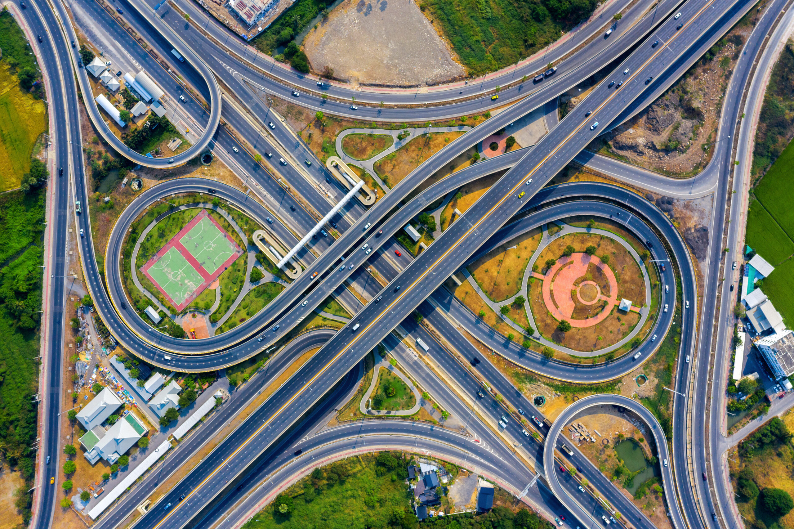 Aerial view of traffic on massive highway intersection.